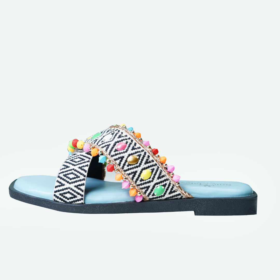 Mykonos Criss Cross Sliders reverse side profile — black and white geometric woven strap with multicolour stone and pom pom embellishment by Solemates by Palak