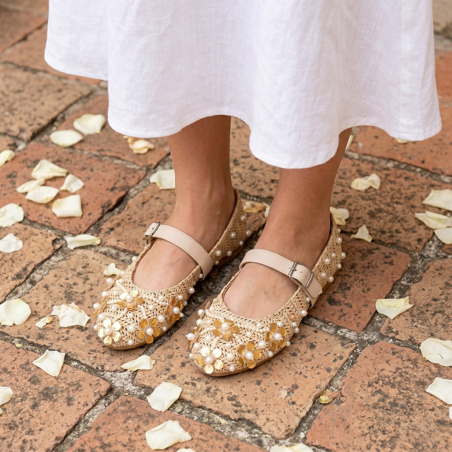 The Gatsby Bloom Mary Jane Flats worn by model — raffia crochet with gold sequin and pearl clusters, nude ankle strap by Solemates by Palak