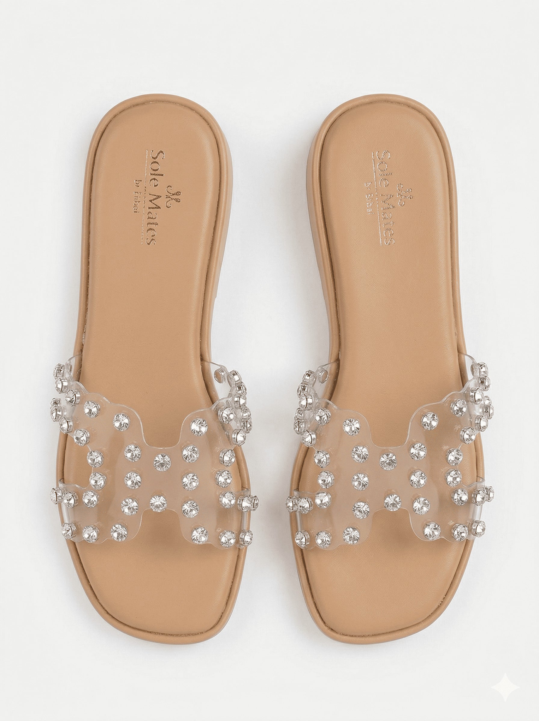 Glass Glow crystal clear strap sliders worn on beach — transparent wedge sliders with silver crystals by Solemates by Palak